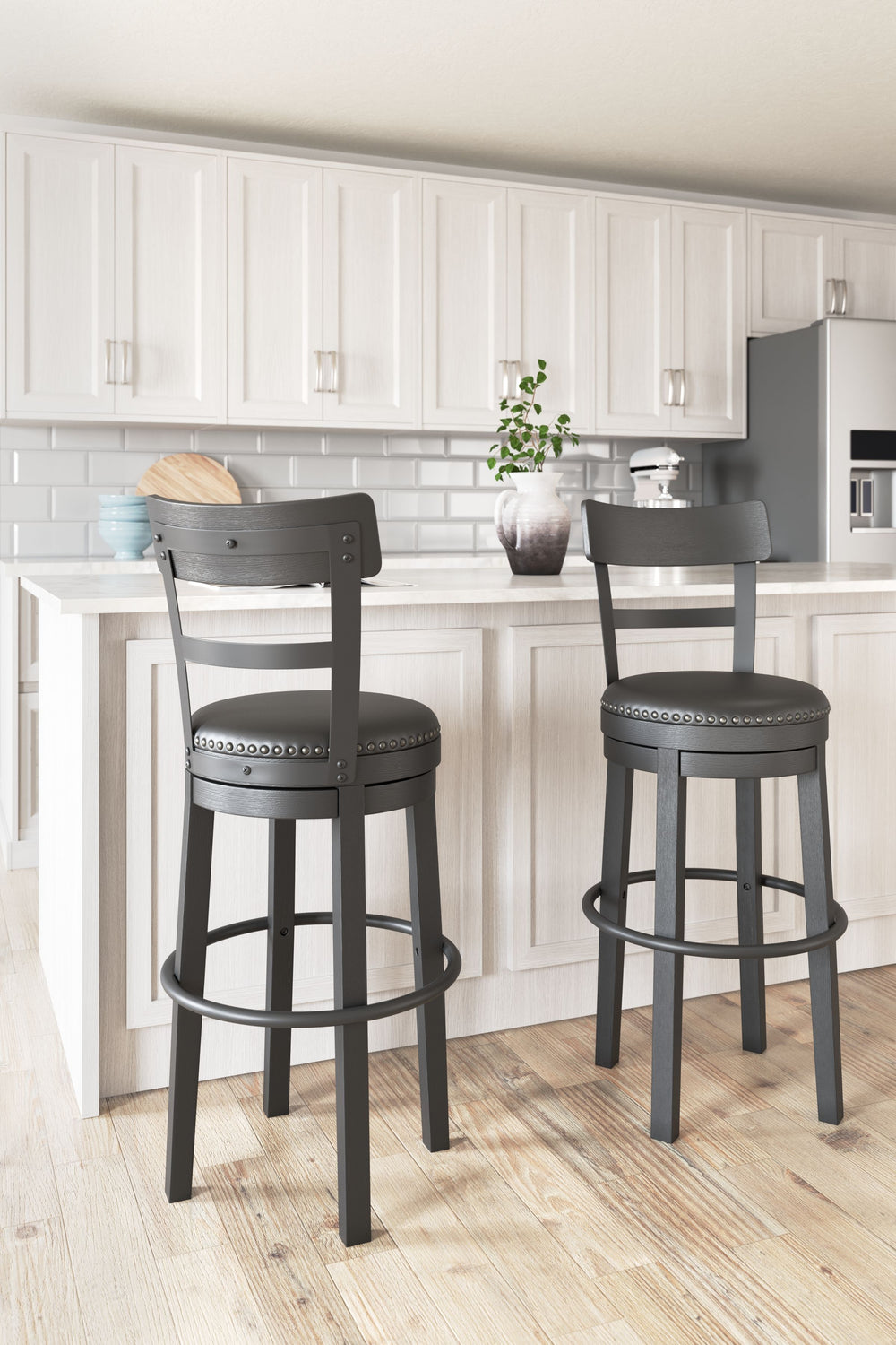 Bring a dash of drama to a kitchen island, table or counter with this upholstered swivel bar stool. The sturdy wood frame with contoured backrest is beautified with an antiqued black finish thatâ€™s a welcome change from the everyday ordinary. For your co