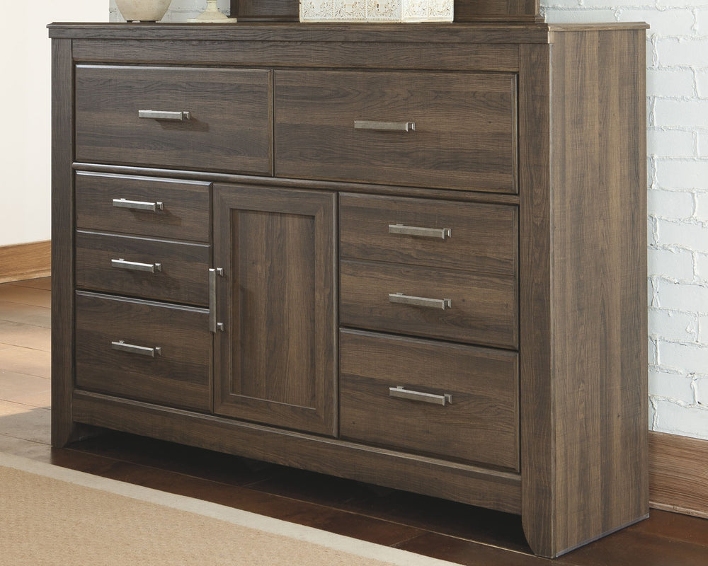 Get the look of posh barn wood without setting foot in a salvage yard. Replicated rough-sawn oak of this dresser has a vintage finish that is reminiscent of a timeworn family heirloom. Warm, rustic and naturally beautiful, itâ€™s just got that ageless app