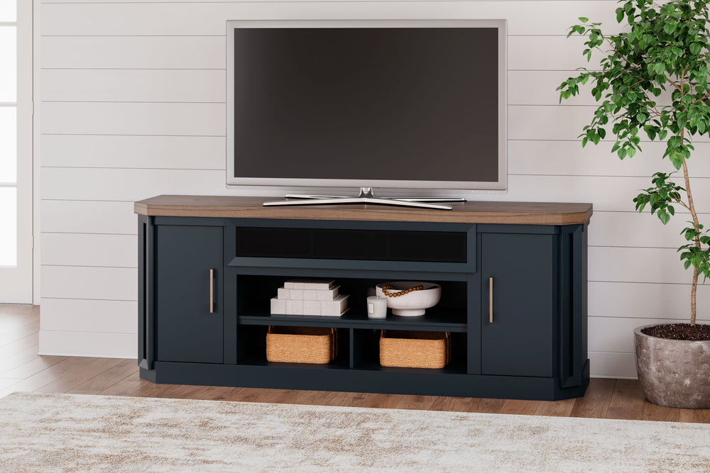 This TV stand combines casual contemporary design with modern appeal. Its combination of a thick-bodied wood-tone top with a slate blue cabinet is a smart choice on so many levels. Stow away electronics in the roomy cabinets, and use the upper shelf to co