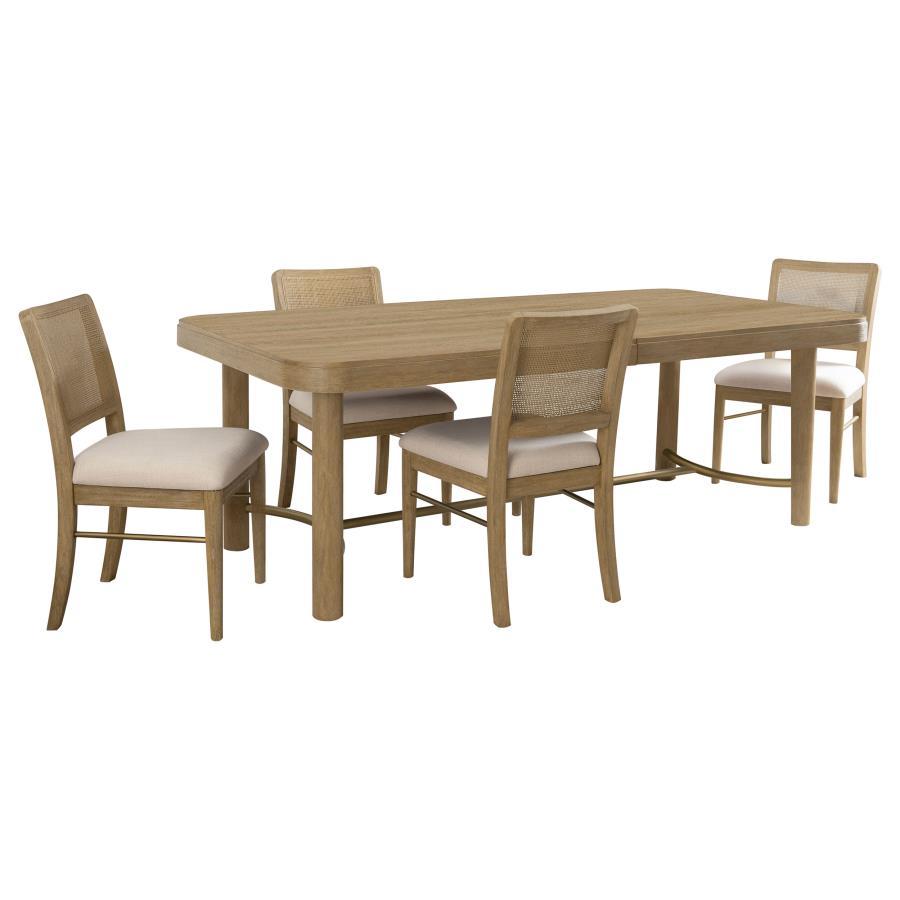 This dining set blends modern craftsmanship with natural textures for a refined yet inviting feel. The dining table features a trestle base with an antique brass-finished metal stretcher bar, adding stability and contrast. Rounded corners soften the recta