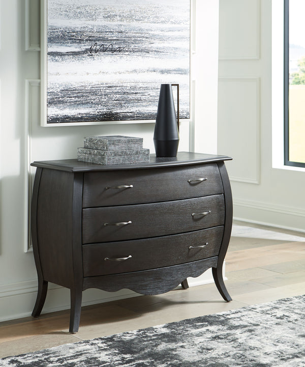  while three drawers ensure a smooth motion for your storage needs. What a charming complement to your 
