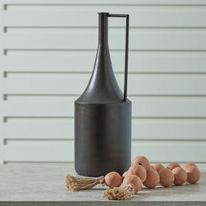  this vase is an eye-catching accent. Its angular handle provides a sharp