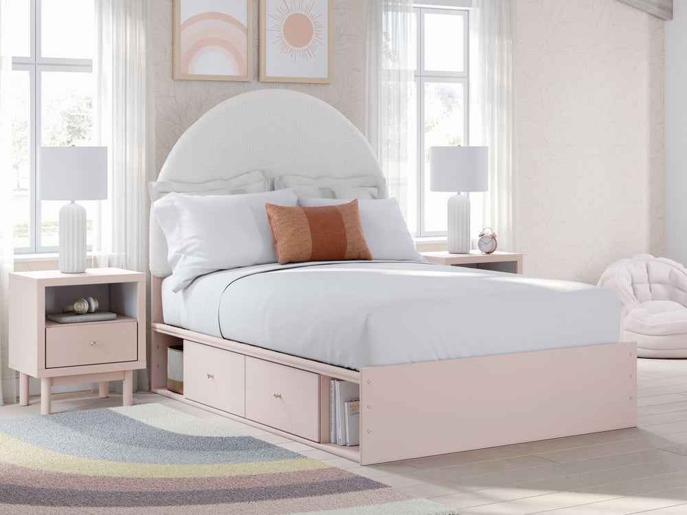 Pretty in pink. This full upholstered panel bed with storage keeps the spirit of your homeâ€™s modern aesthetic while suiting all your young oneâ€™s needs. Its cozy-cute upholstery and subtle blush finish bring a playful, charming vibe to bedtime. Made fo