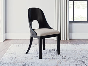  the Rowanbeck home office desk chair makes a lasting impression in a simply stunning way. The magnificence of its trend-right curved silhouette is enhanced with a rich layered black finish over a textured wood grain finish. It