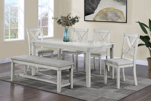 Brighten up your dining space with this charming and versatile dining group, designed to bring a fresh and inviting atmosphere to your home. The beautifully crafted table features a soft, distressed finish that exudes farmhouse elegance while maintaining 