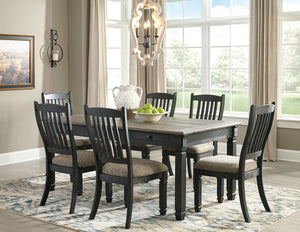 Unique two-tone finish with a combination of Oak and Acacia substrates combining a trendy textured antique black color with table and server tops finished in a textural weathered oak finish. Rectangular dining table features six convenient drawers for sto
