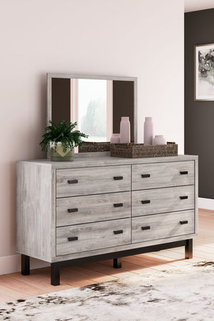  the two-toned Vessalli queen panel bed with extensions brings sleek style to your space. The sheer simplicity of its profile stunningly frames your 