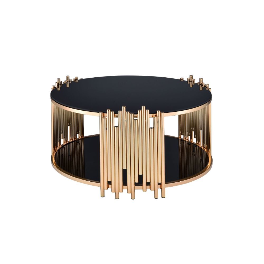 Add a fashion-forward touch of geometry to your living room with the asymmetrical metal tubing detail of the Tanquin black mirror coffee table. This contemporary piece sits on a circular metal drum base with a gold finish and lower shelf. Some Assembly Re