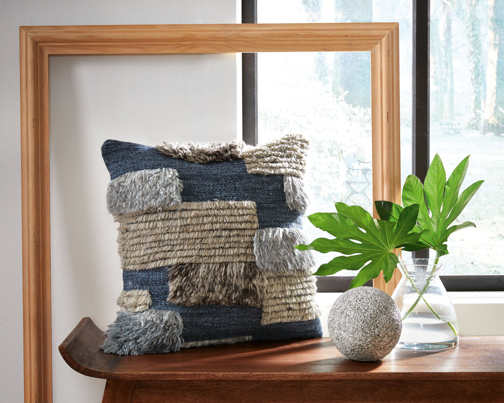 Your eye for playful-yet-simple style takes a textural spin with this pillow. Hand-knotted stripes craft a patchwork look thatâ€™s both inviting and imaginative. Effortlessly chic, this accent piece creates a sense of cozy charm.<br/><br/><b>Product Featu