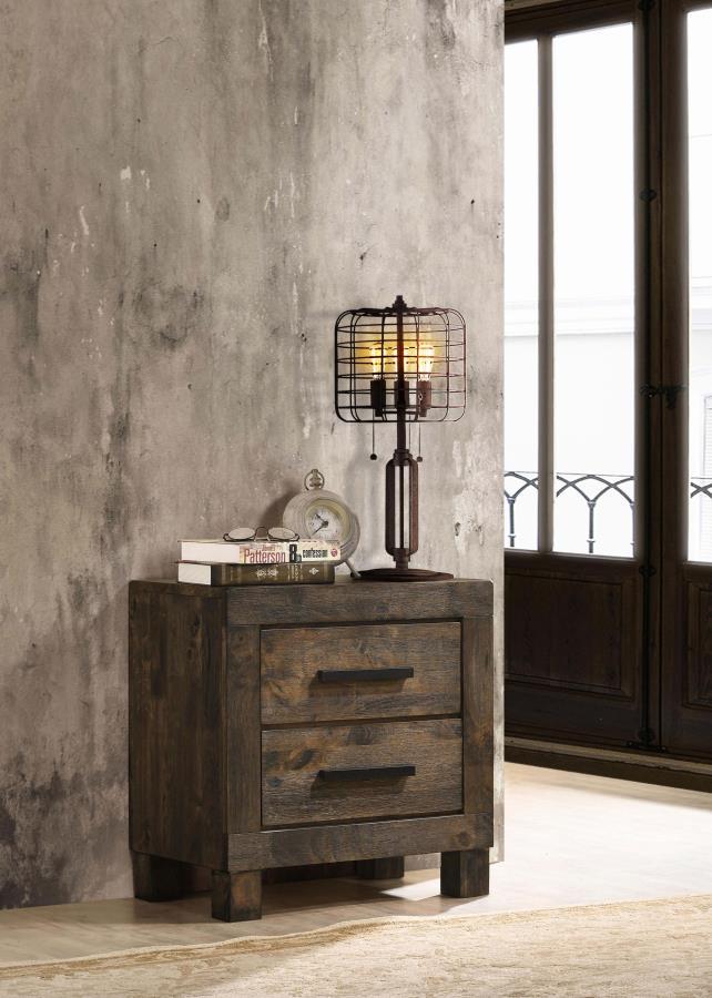 Update a bedroom with strong, stately elegance. Featuring solid hardwood construction, this classic nightstand is a stylish and durable choice. A full matte finish with wire brushed detail gives it a rich, rustic vibe. Wooden handles and thick block feet 