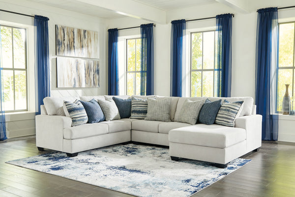 What a pleasant surprise: high-end luxury made comfortably affordable. Thatâ€™s what makes this sectional with chaise in stone gray so alluring. Made exclusively for those wanting to make a designer statement, this finely crafted sectional is dressed to i