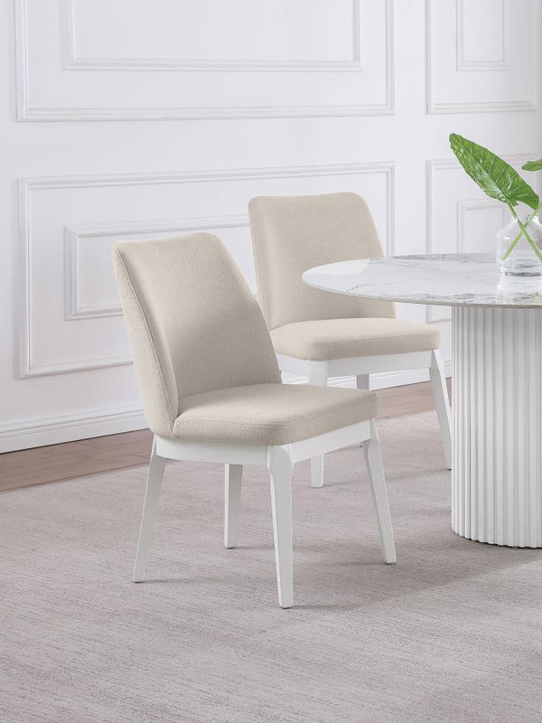  airy sensibility with a set of two modern dining chairs. Each side chair offers excellent comfort and support