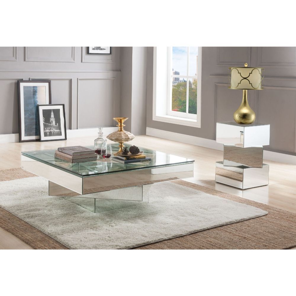 Assambled, Square Coffee Table NO Storage CONSTRUCTION Glass Top: 4mm Clear Tempered Glass (Fixed Top) Mirrored Apron & Pedestal Base<br/><br/><b>Product Features</b><ul><li>Occasional Table</li><li>NO Storage</li><li>Glass Top: 4mm Clear Tempered Glass</