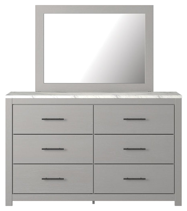 Cool, clean and casually modern. This dresser and mirrorâ€™s wispy dove gray finish and faux Calcutta marble top set the tone for your calming sanctuary. Large linear pulls add dimension and authenticity. Six smooth-gliding drawers neatly accommodate your