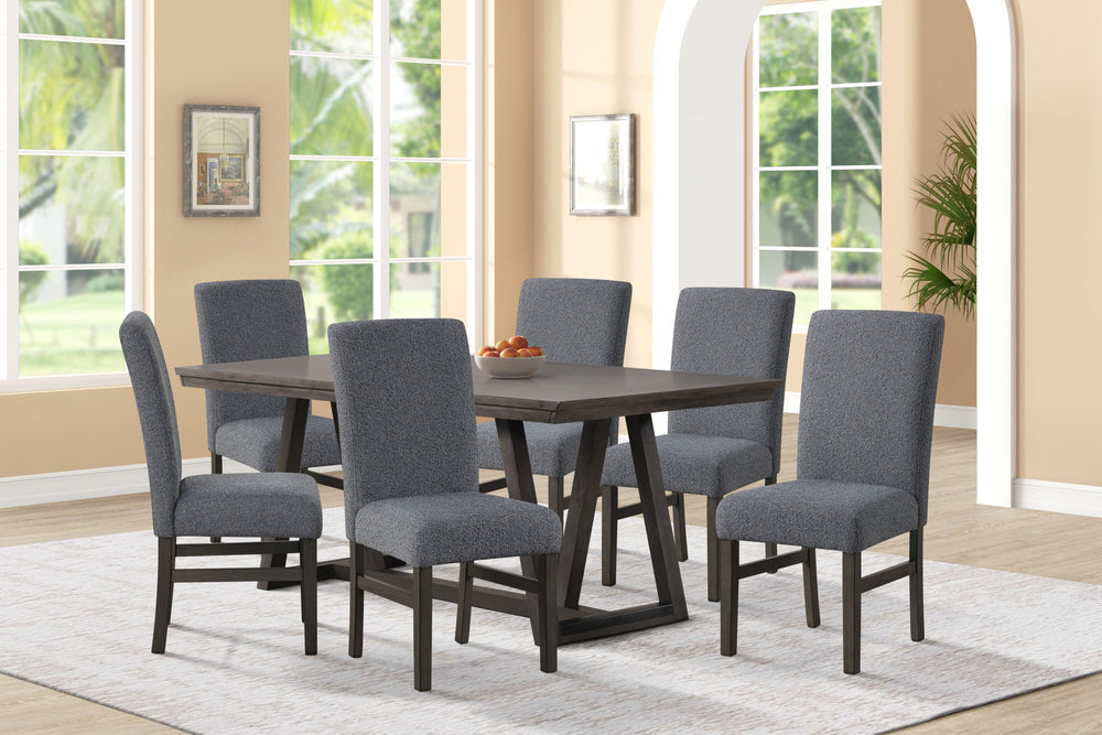 The High Line 7 Piece Dining Set is designed to enhance your dining space with its blend of durability, style, and comfort. This set includes a trestle dining table and six gray upholstered side chairs, expertly crafted from solid Acacia and Rubberwood, c