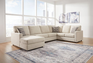  meet superior form. This sectional with chaise and ottoman are strikingly streamlined with its track arms. Cozy cushions invite superior relaxation