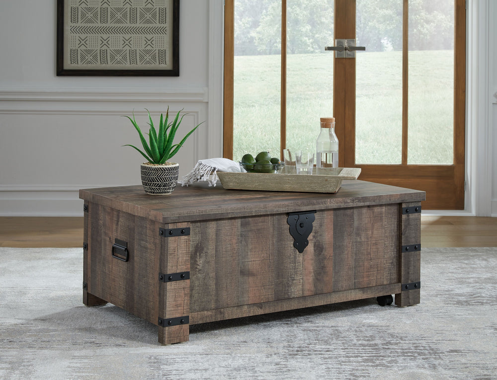 Keep your aesthetic chic and approachable with this charming coffee table. The piece has an effortless beauty, with a replicated aged barn wood pattern and matte black metal accents adding vintage-inspired elegance. Combining elements of fashion and funct