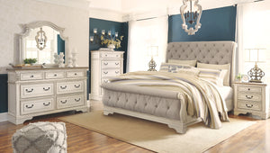  this brilliant upholstered bed wows with a distressed chipped white finish for heirloom appeal. Deep