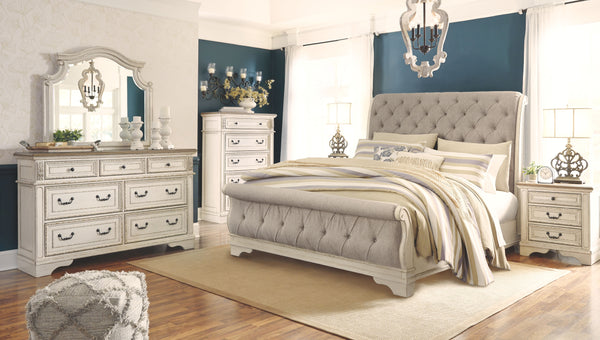  this brilliant upholstered bed wows with a distressed chipped white finish for heirloom appeal. Deep