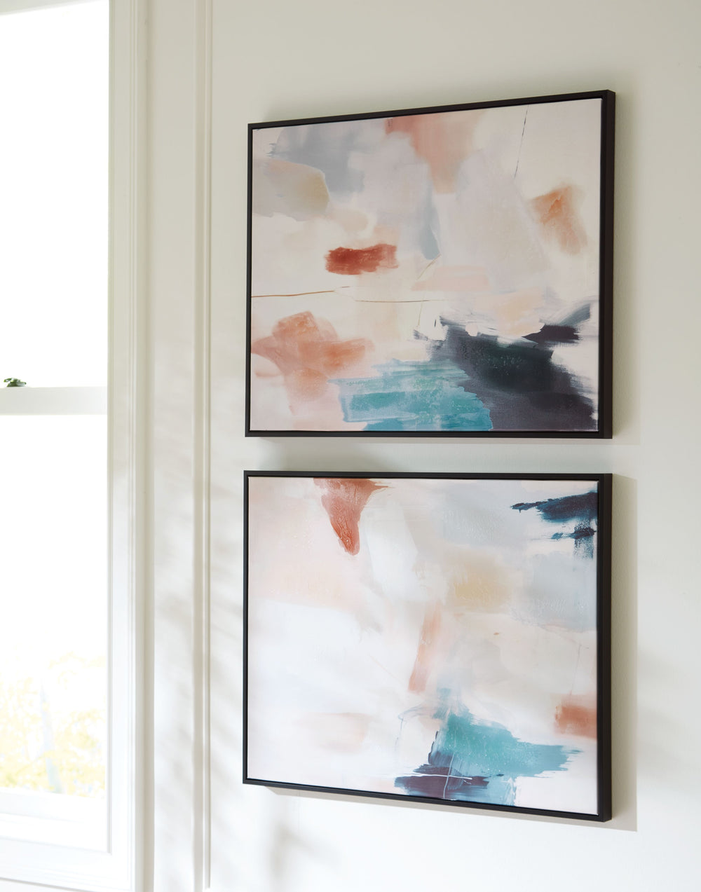 If you agree art should be open to interpretation, then let this wall art set express itself. We love how the quiet shades of blue, pink, white and cream softly speak volumes from the canvas. Hand-painted embellishment adds dimension that makes it all the