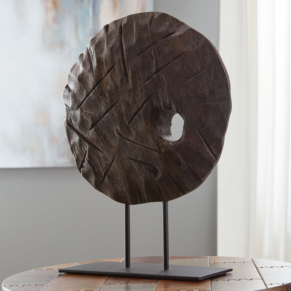 Elegantly adorn your bookshelf, mantel or dining table with this sculpture. Wood in an antiqued brown finish is brimming with natural beauty and adds warmth to your space. A sleekly styled black metal base grounds the piece.<br/><br/><b>Product Features</