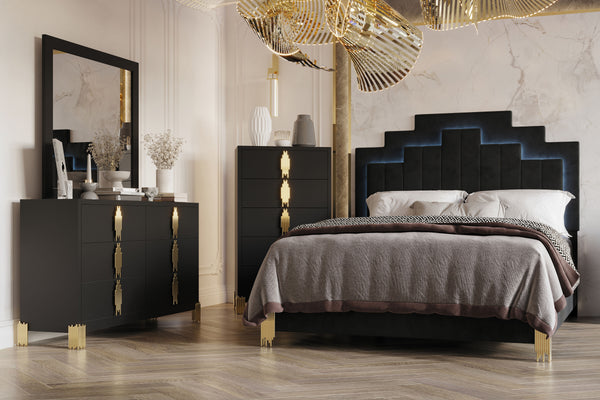 Experience the Empire 4 Piece Bedroom Set, a complete ensemble featuring a bed, dresser, mirror and chest, meticulously crafted for enduring quality and contemporary charm. Constructed from eco-friendly manufactured woods and adorned with a sleek black fi