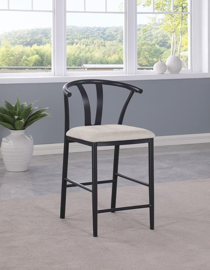 Inspired by Danish design, this counter height wishbone chair brings a touch of modern elegance to your dining or bar area. Its sleek metal frame offers exceptional sturdiness and durability, ensuring long-lasting use while maintaining a minimalist aesthe