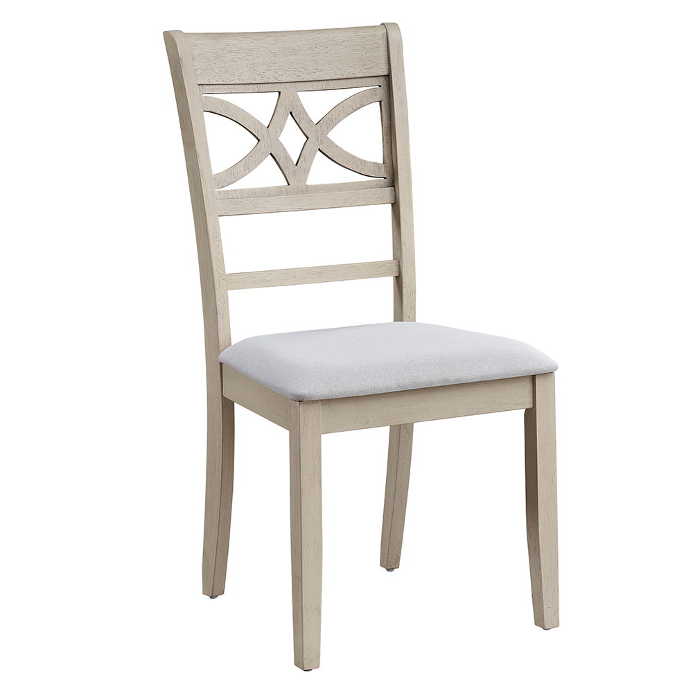 Ferris dining table boasts an antique gray finish exuding timeless elegance. The set includes chairs with intricately designed backs and padded seat cushions, ensuring comfort and style for your dining experience. Perfect for both casual meals and formal 