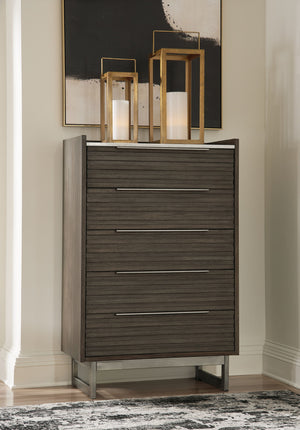  while the streamlined silhouette features overlay slats to create visual interest. A metal base and 
