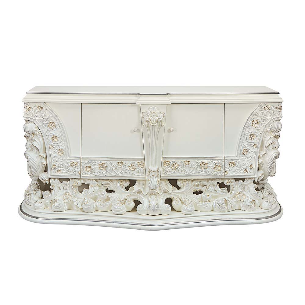 Exuding elegance and refinement, the Adara dining table is designed after the elaborate Rococo style. The single pedestal base is elaborate and commands the attention of everyone. Leave guests stunned with its beauty. Floral and leaf motives make up the c