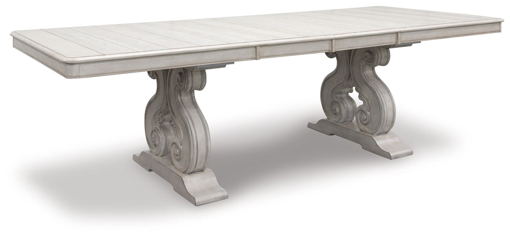 Add a touch of romance to your home with this dining room set. The painted finish and shapely silhouette are all about easy elegance. Turning the focus on the double sculptural pedestal base, this graceful table adds a dash of upscale luxury to the dining