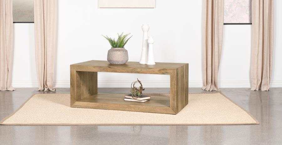 Embracing the very soul of natural design principles, elevate your living room with this rectangular coffee table crafted from solid mango wood. Its natural finish highlights the unique grain patterns, adding warmth and texture to your space. Designed wit