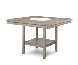 Elevate your dining experience with this elegant counter height dining set, designed to blend seamlessly with any modern or rustic dÃ©cor. The set features a spacious, finely crafted table with a built-in faux marble turntable and open lower shelf in a we