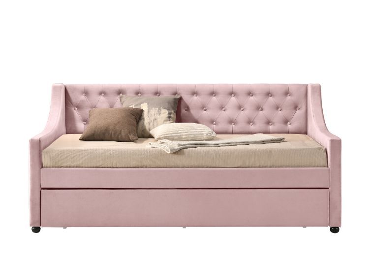 The fully upholstered daybed embodies a classic aesthetic infused with rich textures. Wooden frame is graced with gentle curves and elegant details while button-tufted velvet upholstery makes you indulge in a luxurious comfort. An additional trundle under