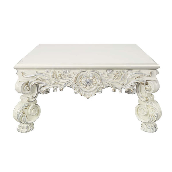  this console table features a round tabletop that is followed by intricate detailing around t