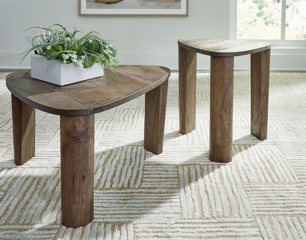 This accent table set has an elevated air, defining your living room with simply elegant style thatâ€™s equally as functional. Each table is made with naturally beautiful mango wood and further refined with a grayish brown finish. The coffee table is a pe