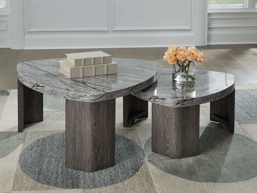 Striking contemporary form, meet canâ€™t-miss function. This stacked coffee table pairs the look of faux gray marble with a weathered gray wood grain for a simply chic approach to monochromatic style. Make the most of your space with its cantilevered desi
