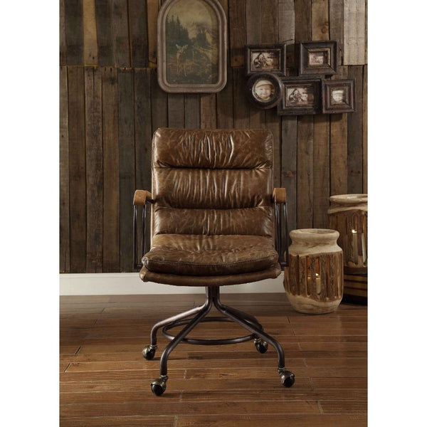  channel-seamed vintage top grain leather upholstery is complemented by a metal base with casters and metal frame armrests. It-'s Industrial design promise comfort and function a