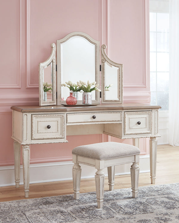  this 3-piece vanity set is your dream bedroom retreat realized. Its antiqued two-tone aesthetic blends a chipped white with a distressed wood finished top for added charm. Framed drawer fronts and a plushl