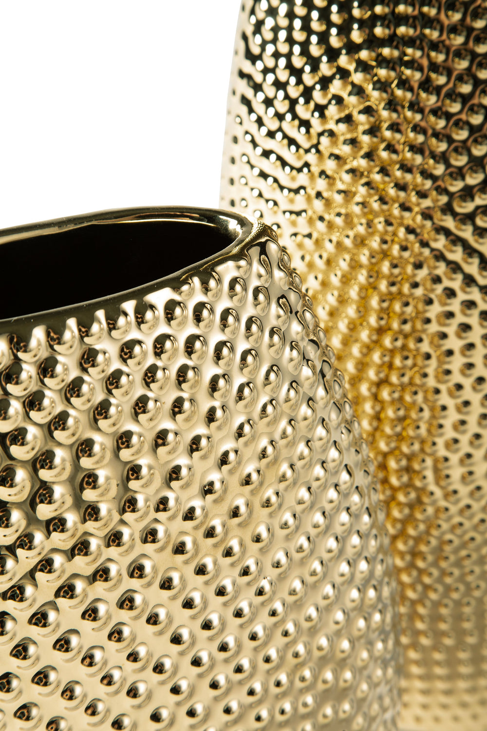 Upgrade your interiors with the elegant look of gold. This glazed goldtone ceramic vase is a beautiful way to display a floral arrangement. But it also draws attention even when sitting empty on a mantel, tabletop or other surface.<br/><br/><b>Product Fea