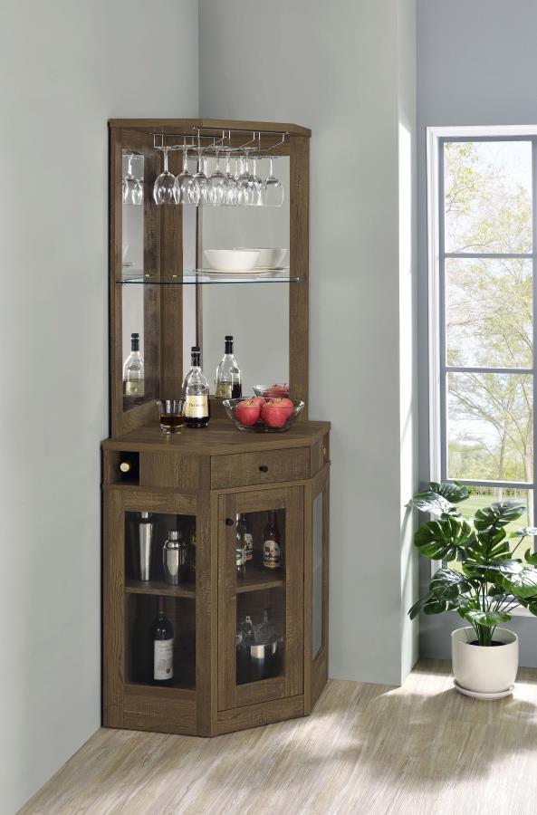 Place this corner bar cabinet in a modern farmhouse home to lend a charming country style. Constructed of durable, high pressure engineered veneer laminate, this cabinet comes in a rustic oak finish and features a mirrored back panel. Store your finest li