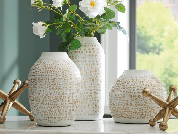  adorned with delicate goldtone accents