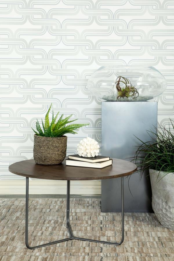  this round accent table is the perfect complement to any seating arrangement. Crafted from eco-friendly solid mango wood
