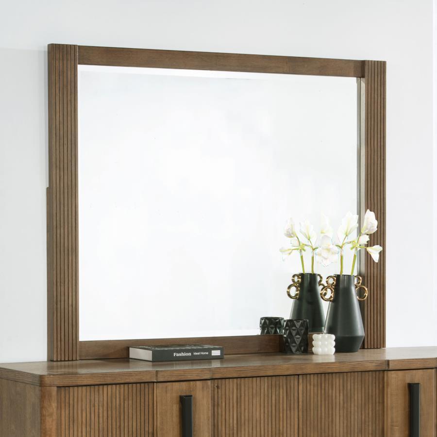 Offer a tailored touch to your bedroom with a modern framed dresser mirror. It mounts directly to the back of the dresser, offering reflectivity and lightness to surrounding decor. The mirror frame boasts a cool ash brown wood finish and features vertical