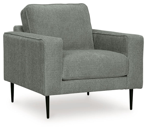  the slim-profiled piece welcomes you with its cozy character. A subtle chevron pattern on the cushions refresh the classic neutral hue