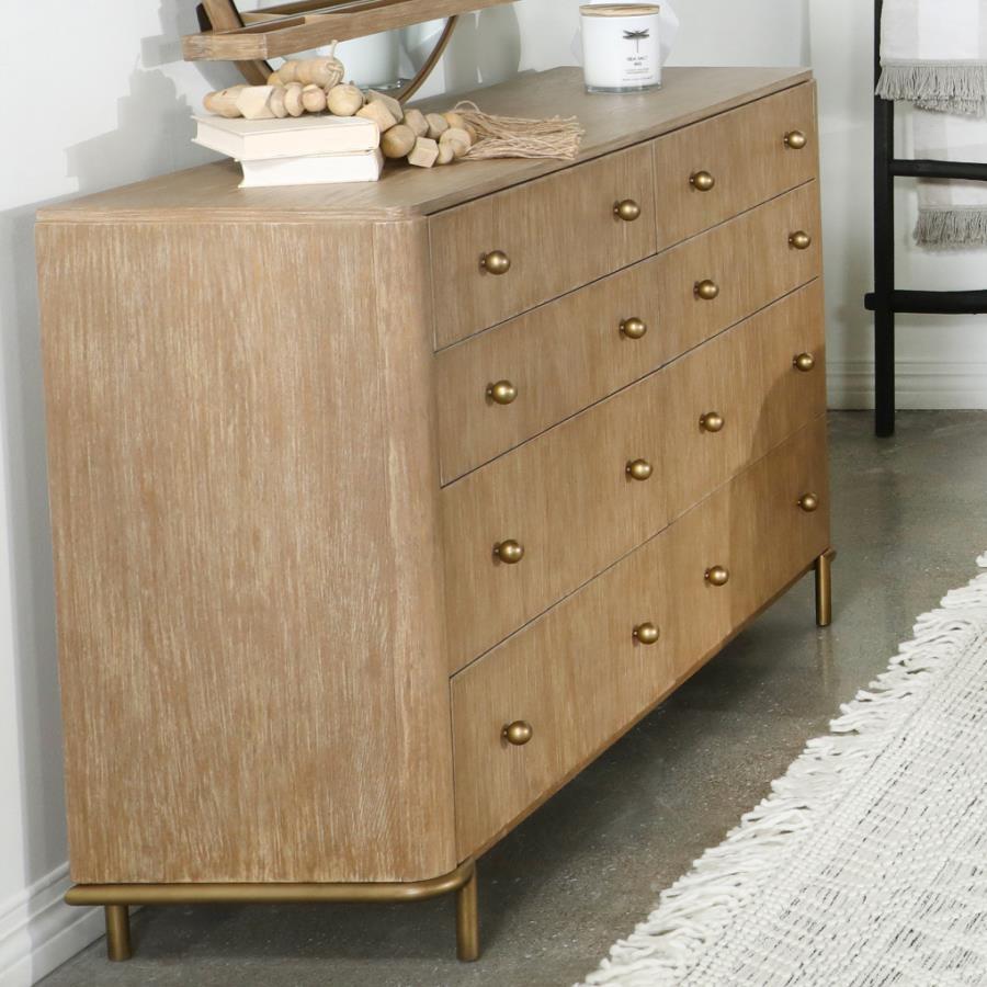 Create a modern glam vibe to your bedroom with this mid-century modern dresser. An elegant neutral tone works with numerous color palettes, presented in the sand wash finished wood. Wire-brushed finishing offers a subtle texture and organic nature to this