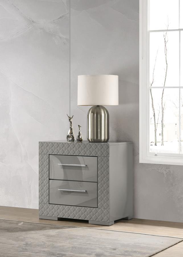 Add a touch of sophistication to your bedroom with this elegant nightstand. Featuring a high gloss finish, it reflects a modern Italian style with a clean, minimalist design. The nightstand includes two spacious drawers, perfect for keeping your bedside e