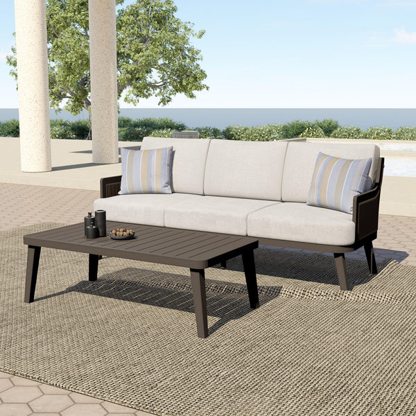 featuring a spacious patio sofa and a stylish coffee table