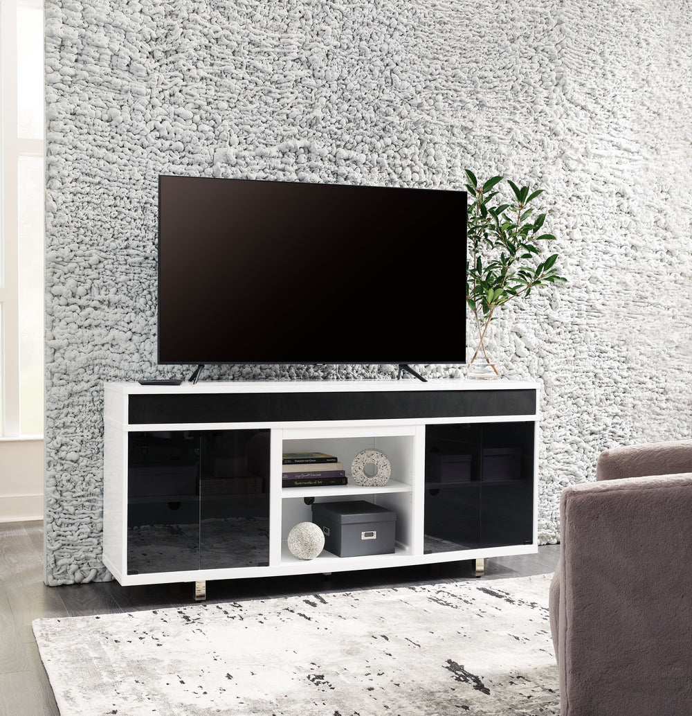 Combining a white high-gloss finish with black glass doors, this TV stand proves opposites really do attract. It-'s the perfect blend of modern style and functionality, with an electric fireplace option and ample space for your media devices, flat-screen 