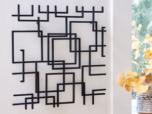  this wall sculpture is sure to add an artistic note to your modern interior. Its abstract style incorporates squares overlapping with fragmented lines in a black finish